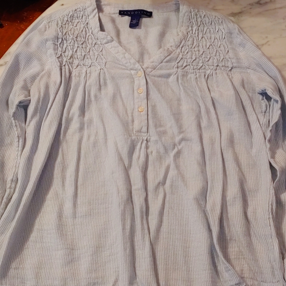 Woman's Randolino button down v neck blue shirt